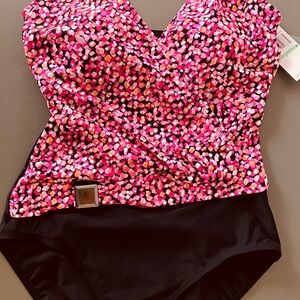 Pretty Christina Swimwear one-piece with black bottom, pink orange & white top
